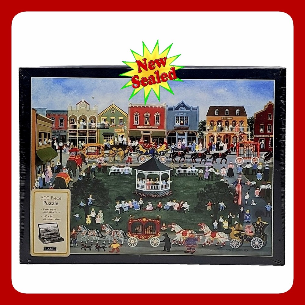 LANG Village Celebration 500pc Jigsaw Puzzle Folk Art Mary Singleton New
